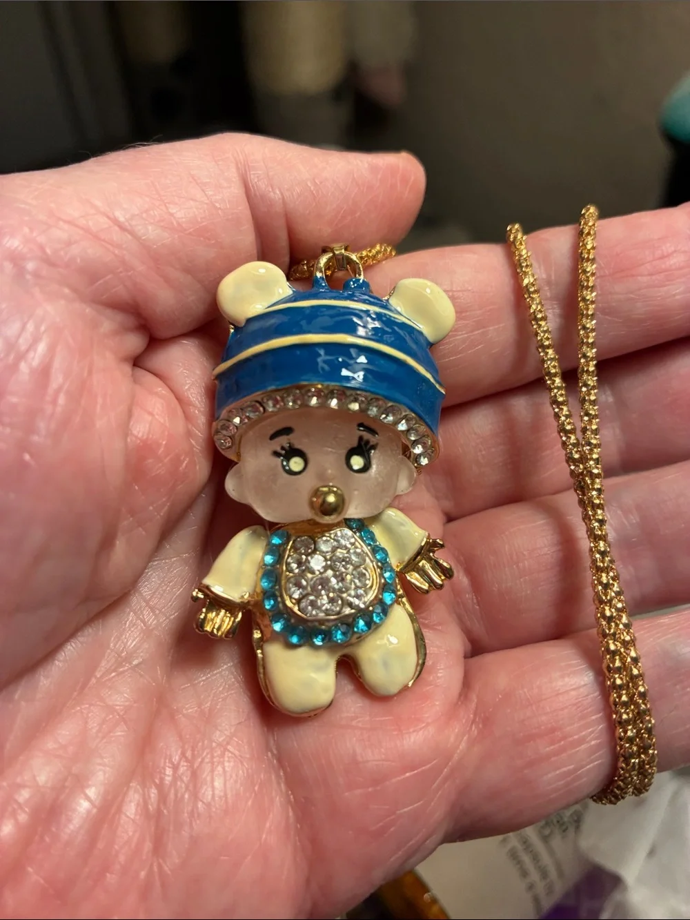 Moveable baby boy Pendant with Blue Hat and Crystal Accents. Head/body turn.